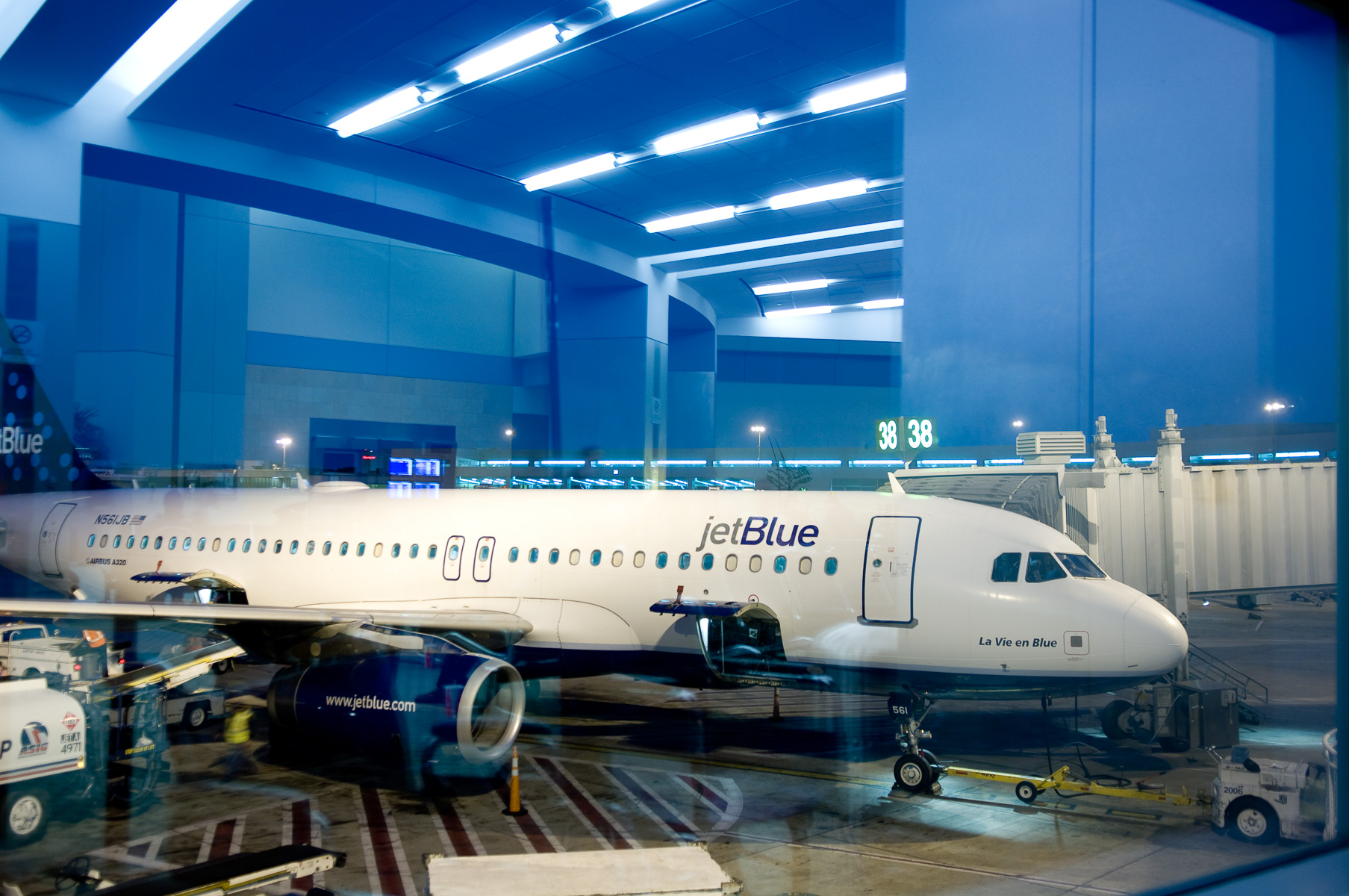 Jet Blue Airplane parked at gate
