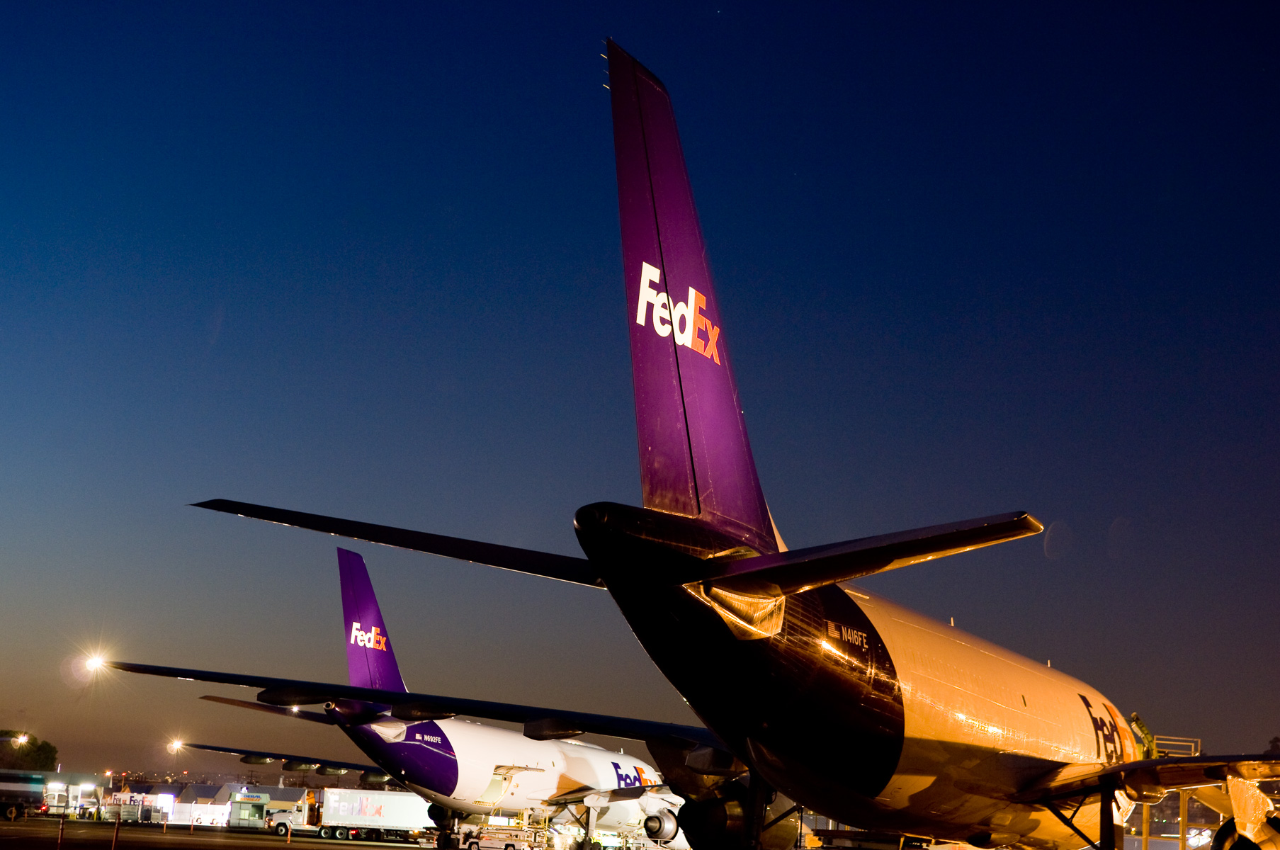 FedEx planes at night