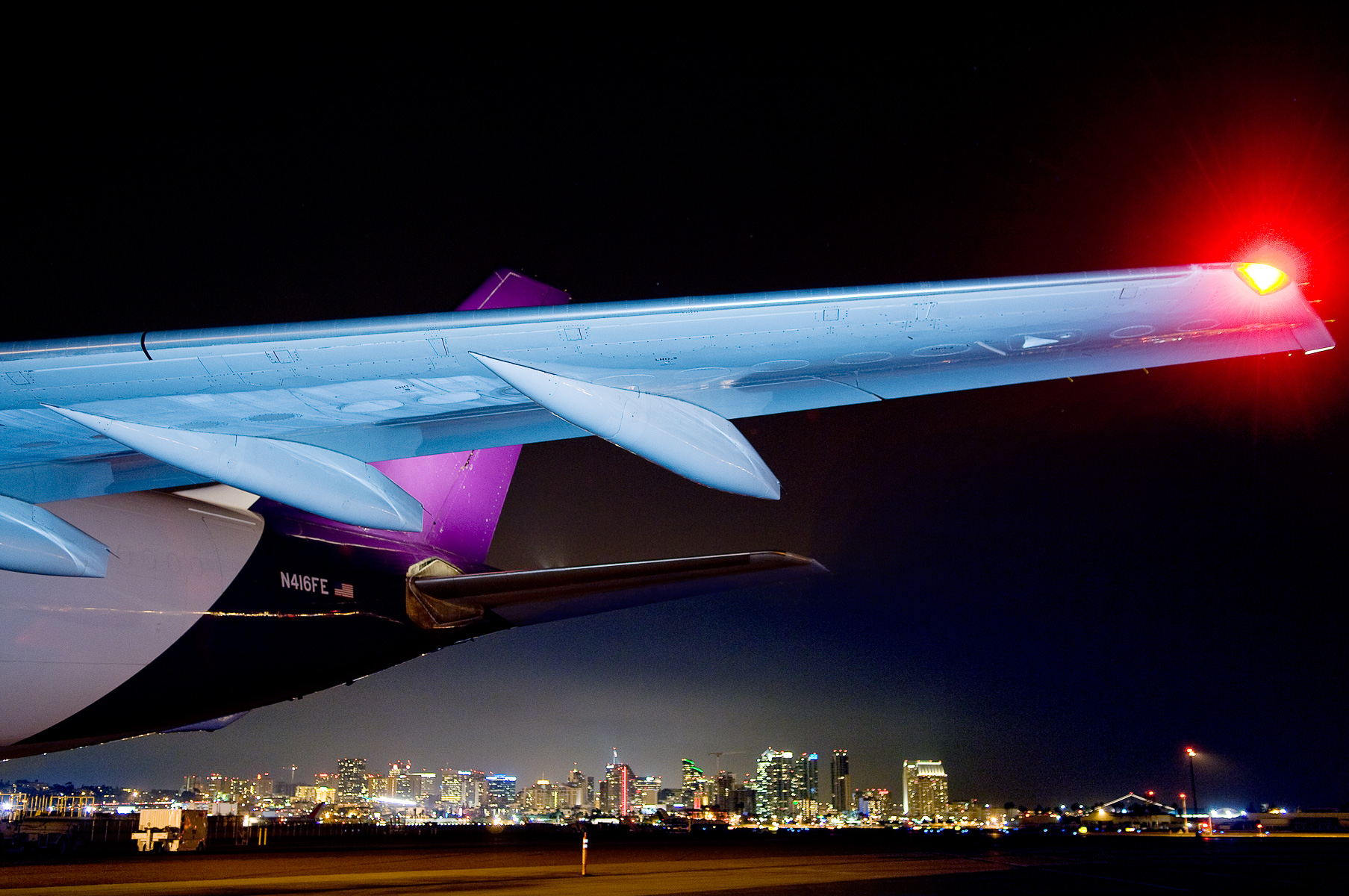 FedEx airplane wing at night