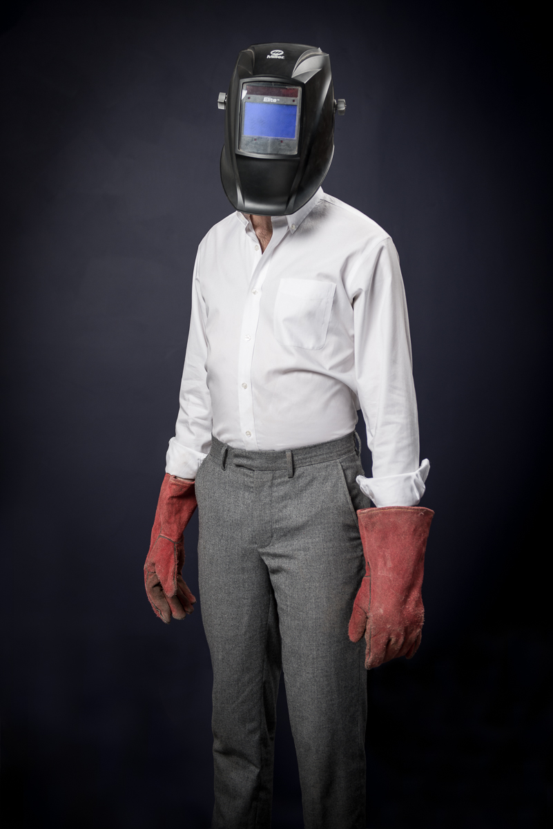 Portrait of welder in business attire