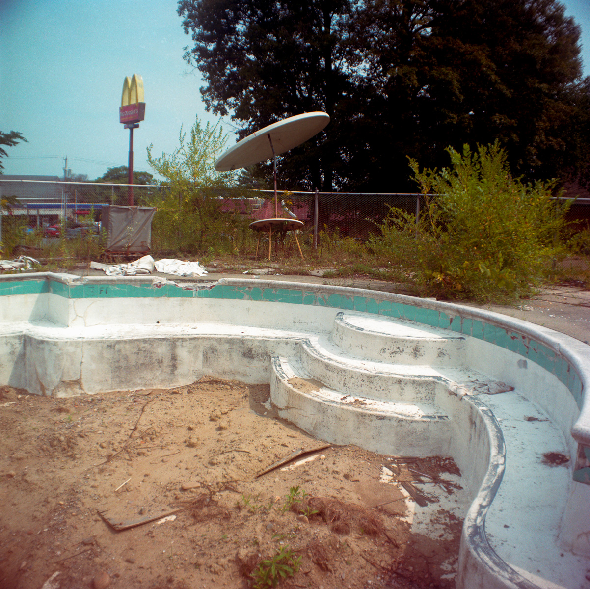 Abandoned pool and McDonalds