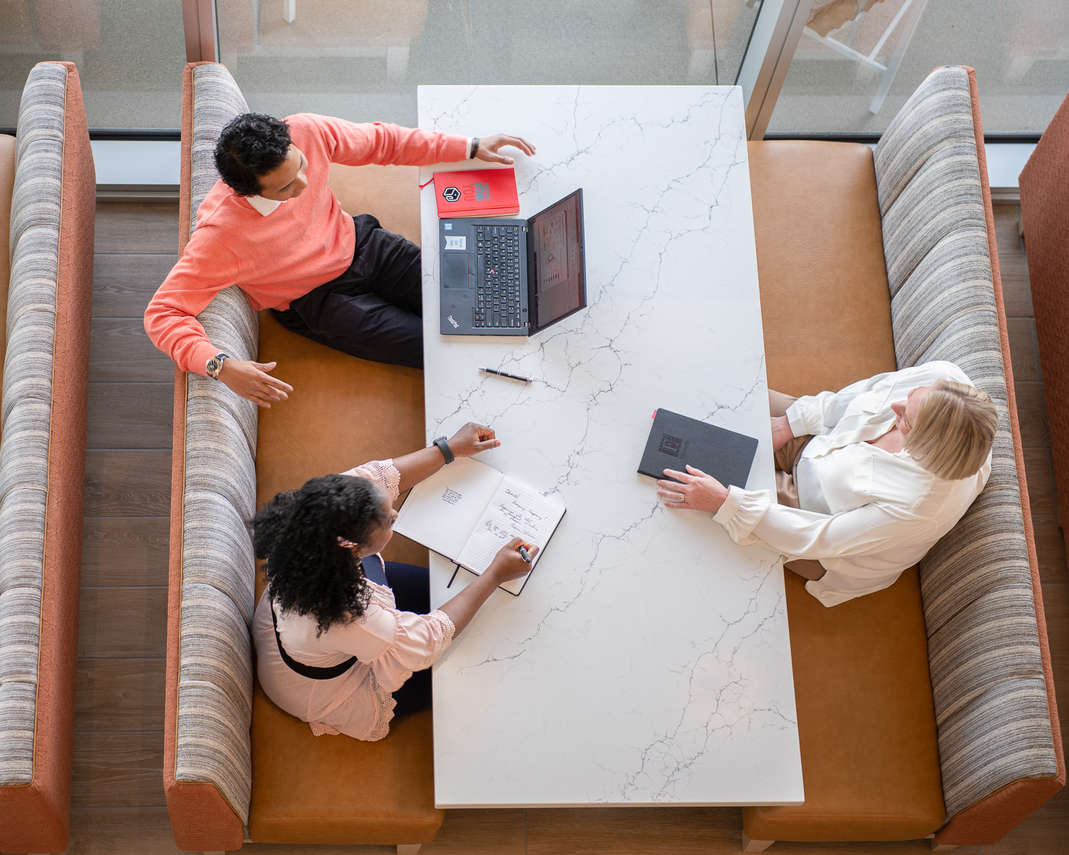 Overhead view of small corporate meeting